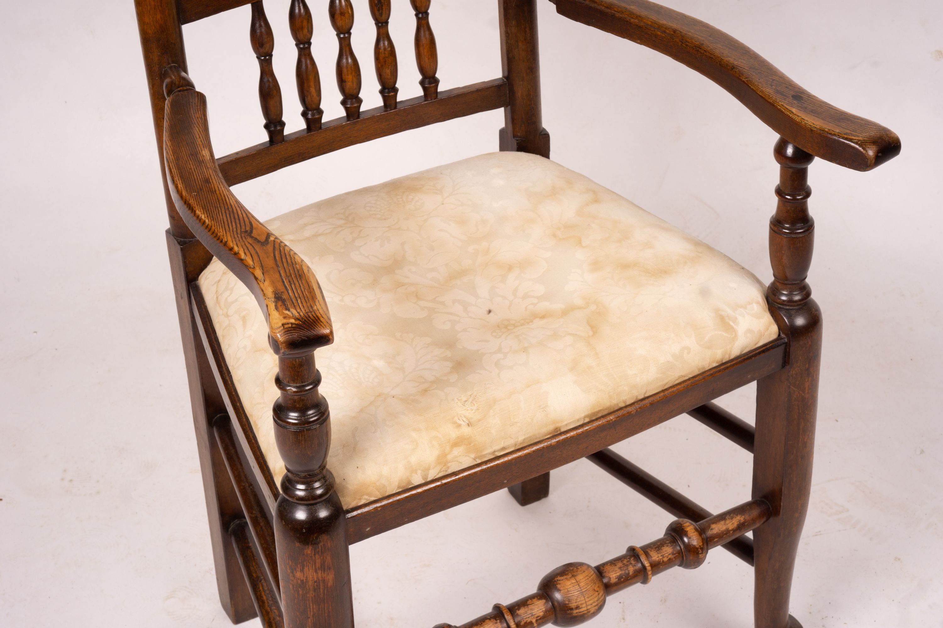 An 18th century style Lancashire ash and beech spindle back dining chair